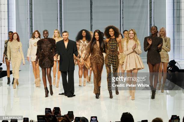 Olivier Rousteing and models walks the runway during the Balmain Festival V02 Womenswear Spring/Summer 2022 show as part of Paris Fashion Week at La...