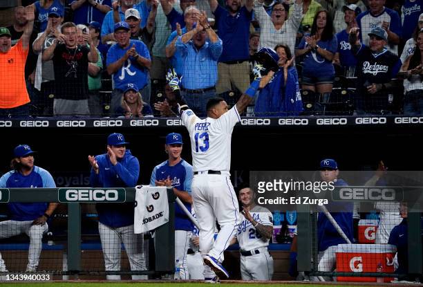 Salvador Perez of the Kansas City Royals gets a standing ovation from the crowd after hitting a three-run home run in the first inning against the...
