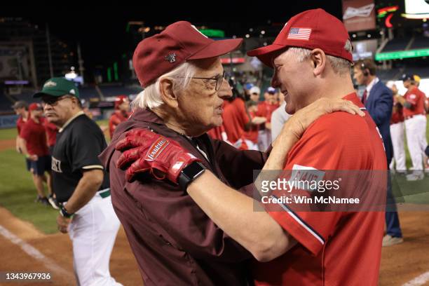 Rep. Steve Scalise talks with Democratic team coach Rep. Bill Pascrell following the Congressional baseball game at Nationals Park September 29, 2021...
