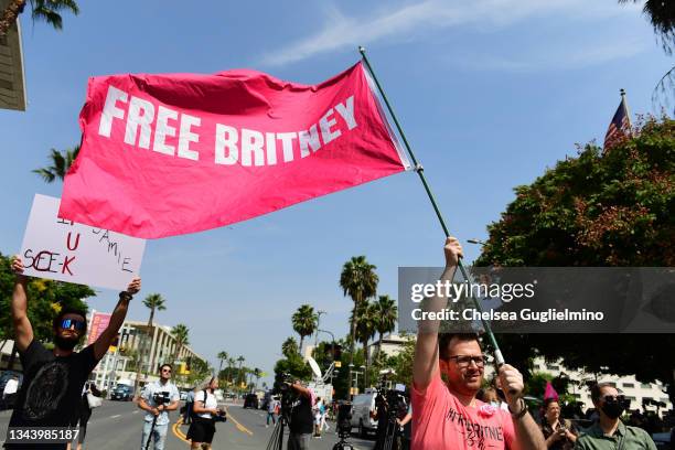 FreeBritney activists protest during a rally held in conjunction with a hearing on the future of Britney Spears' conservatorship at the Stanley Mosk...