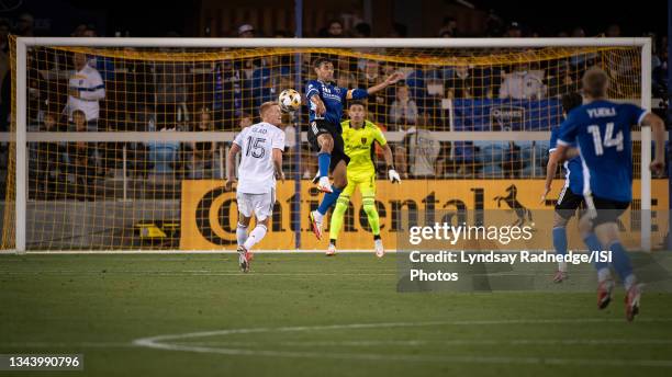 Justen Glad of Real Salt Lake challenges Chris Wondolowski of the San Jose Earthquakes during a game between San Jose Earthquakes and Real Salt Lake...