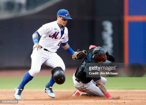 Javier Baez of the New York Mets tags out Jazz Chisholm Jr. #2 of the Miami Marlins as tried to steal second base during the third inning at Citi...