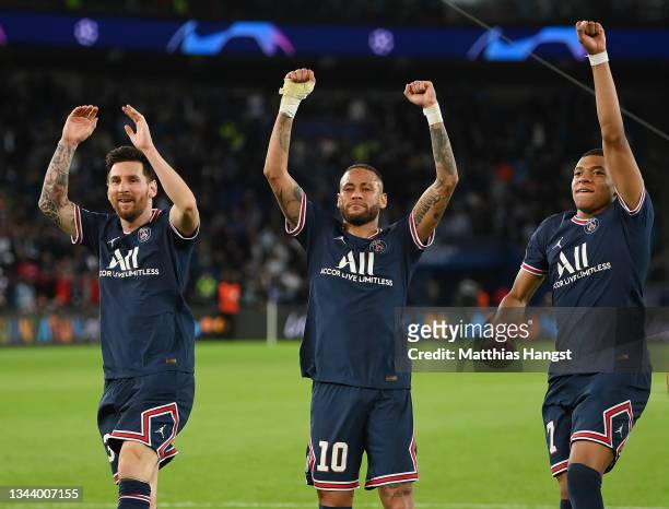 Lionel Messi, Neymar and Kylian Mbappe of Paris Saint-Germain celebrate after victory in the UEFA Champions League group A match between Paris...
