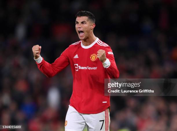 Cristiano Ronaldo of Manchester United celebrates victory on the final whistle after scoring a stoppage time winner during the UEFA Champions League...