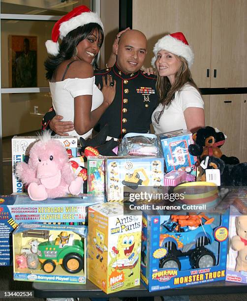 Playboy Playmates Deanna Brooks and Qiana Chase with Sgt. Rene Renceria, 29 from Downey, CA. And members of The United States Marines *Exclusive*