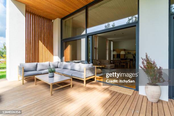 cozy patio with entrance to the house - modern building stock pictures, royalty-free photos & images