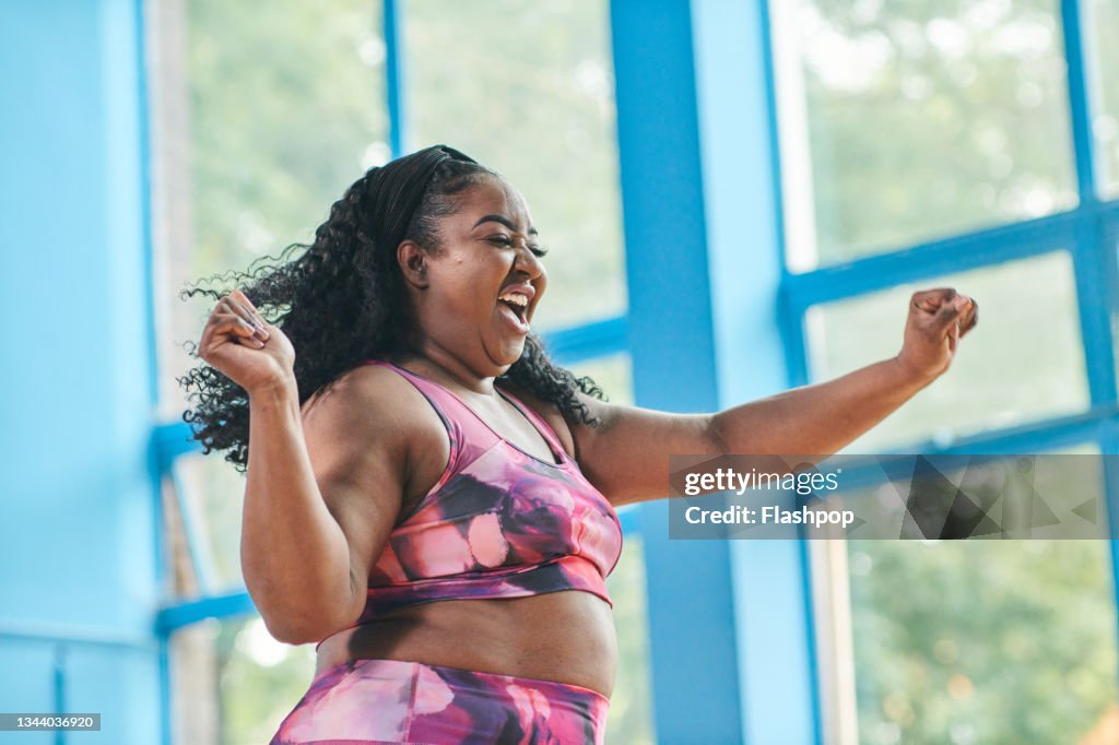 Portrait of a woman exercising at the gym