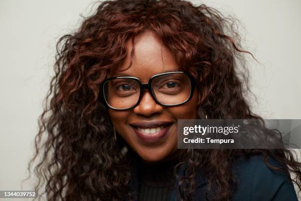 portrait of a young woman with retro glasses. - horn rimmed glasses stock pictures, royalty-free photos & images