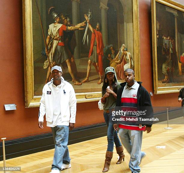 Chris Tucker and his wife Benissima during Chris Tucker Visits the Louvre - October 14, 2005 at The Louvre in Paris, France.