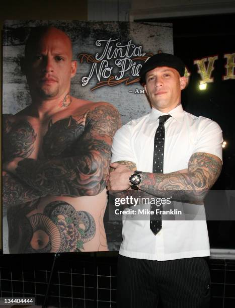 Ami James of the TV show Miami Ink unveils his Peta ad at his bar Love Hate January 24, 2008 in Miami Beach, Florida.