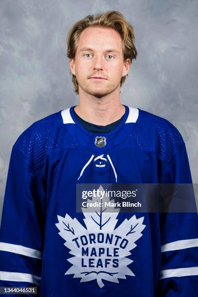 Rasmus Sandin of the Toronto Maple Leafs poses for his official headshot for the 2021-2022 season on September 22, 2021 at the Ford Performance...