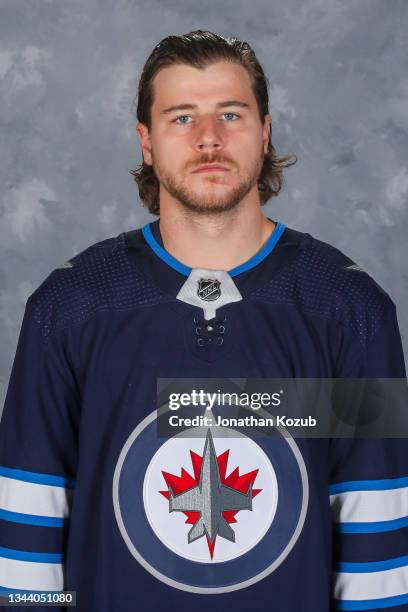 Nathan Beaulieu of the Winnipeg Jets poses for his official headshot for the 2021-2022 season on September 22, 2021 at the Bell MTS Iceplex in...