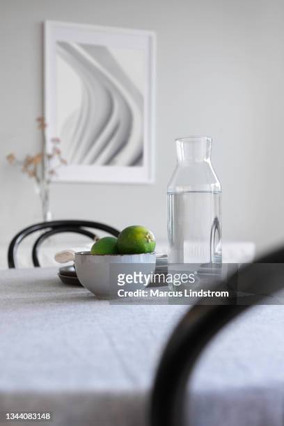 close up view of a kitchen table in a modern home - karaffin bildbanksfoton och bilder