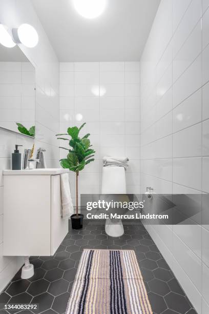 small tiled bathroom - toilet bildbanksfoton och bilder