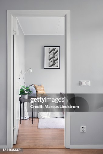 View into a modern guest room through a doorway View into a modern guest room through a doorway