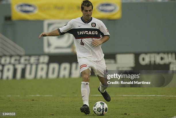 Carlos Bocanegra of the Chicago Fire passes the ball during the MLS game against the Dallas Burn on August 10, 2002 at the Cotton Bowl in Dallas,...