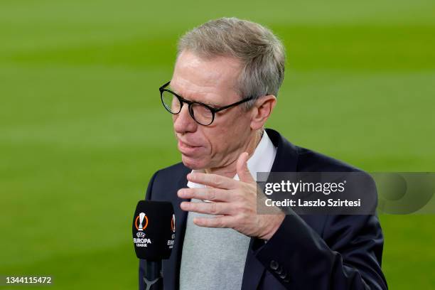 Peter Stoger, Head Coach of Ferencvarosi speaks during a TV Interview prior to the UEFA Europa League group G match between Ferencvarosi TC and Real...