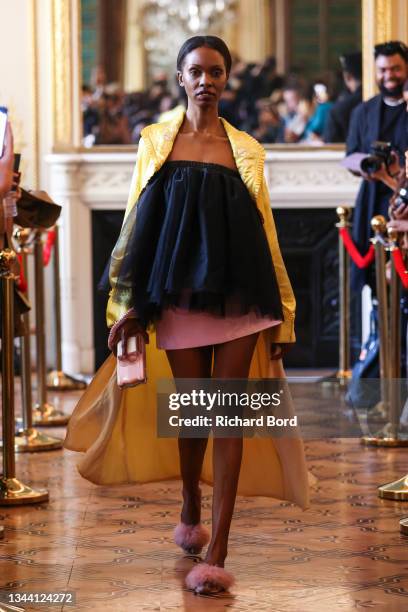 Model walks the runway for Emma's Dilemmas during the Flying Solo Womenswear Spring/Summer 2022 show as part of Paris Fashion Week on September 30,...