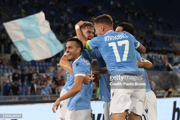 Toma Basic of SS Lazio celebrates with team mate Pedro and Ciro Immobile after scoring their sides first goal during the UEFA Europa League group E...