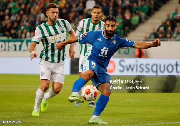 Nabil Fekir of Real Betis scores their side's first goal during the UEFA Europa League group G match between Ferencvarosi TC and Real Betis at...