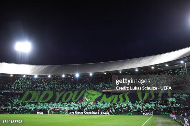 General view inside the stadium as Feyenoord fans wave flags prior to the UEFA Europa Conference League group E match between Feyenoord and Slavia...