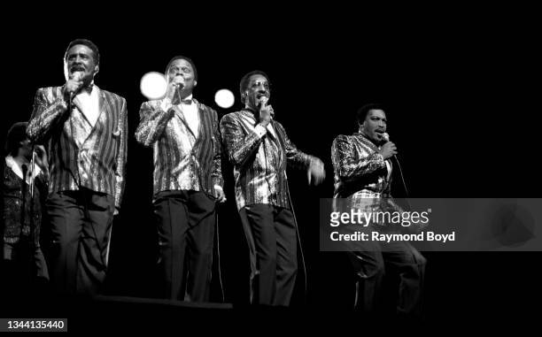 Singers Levi Stubbs, Renaldo 'Obie' Benson, Abdul 'Duke' Fakir and Lawrence Payton, Jr. Of The Four Tops performs at the Auditorium Theatre in...