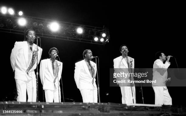 Singers Melvin Franklin , Ali-Ollie Woodson , Otis Williams , Ron Tyson and Richard Street of The Temptations performs at the Auditorium Theatre in...