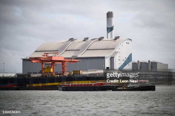 The Cory Riverside Energy incineration facility is seen from the river Thames on September 30, 2021 in London, England. The Museum of London...
