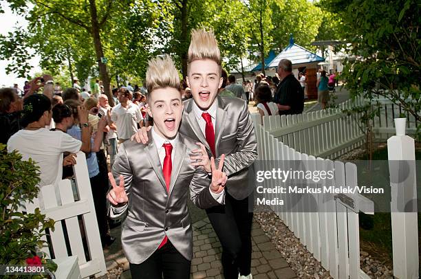 John Grimes and Edward Grimes of 'Jedward' pose backstage during the ZDF Fernsehgarten tv show on June 5, 2011 in Mainz, Germany.