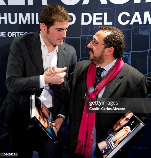 Real Madrid goalkeeper Iker Casillas and writer Enrique Ortego attend the presentation of the new book "Iker Casillas. La Humildad del Campeon" at...