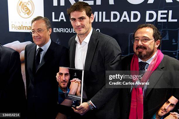 Real Madrid President Florentino Fernandez, Real Madrid goalkeeper Iker Casillas and writer Enrique Ortego attend the presentation of the new book...