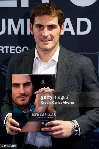 Real Madrid goalkeeper Iker Casillas poses for the photographers during the presentation of his biography "La Humildad del Campeon" at the Santiago...