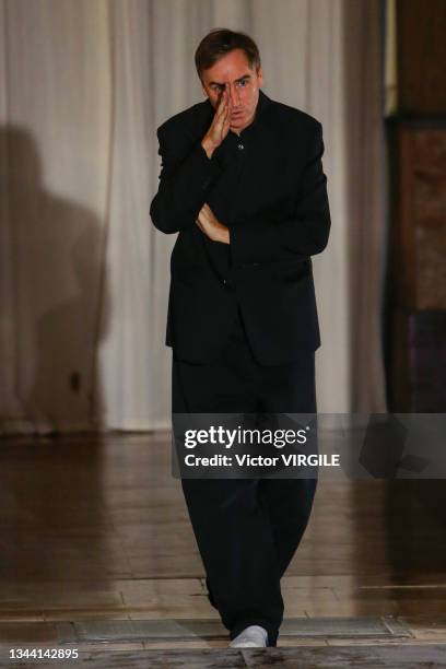 Fashion designer Raf Simons walks the runway during the Raf Simons Ready to Wear Spring/Summer 2022 fashion show as part of the Paris Fashion Week on...