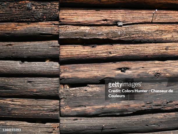 natural and weathered wood wall in haute-savoie - haute savoie foto e immagini stock