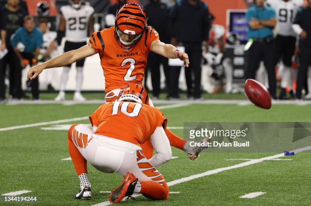 Evan McPherson of the Cincinnati Bengals kicks a game winning field goal against the Jacksonville Jaguars during the second half of an NFL football...