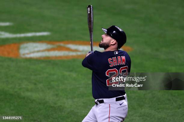 Travis Shaw of the Boston Red Sox hits against the Baltimore Orioles at Oriole Park at Camden Yards on September 30, 2021 in Baltimore, Maryland.