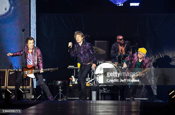 Guitarist Ronnie Wood, singer Mick Jagger, drummer Steve Jordan and guitarist Keith Richards of The Rolling Stones perform at Bank of America Stadium...