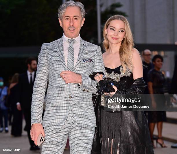 Alan Cumming and Dove Cameron arrive to the 2021 New York City Ballet Fall Fashion Gala at Lincoln Center on September 30, 2021 in New York City.