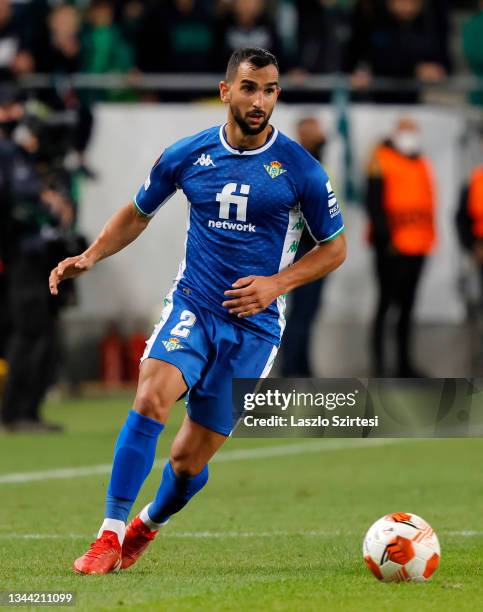 Martin Montoya of Real Betis controls the ball during the UEFA Europa League group G match between Ferencvarosi TC and Real Betis at Ferencvaros...