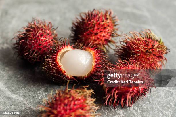 still life close-up of ripe rambutan fruit - rambutan bildbanksfoton och bilder