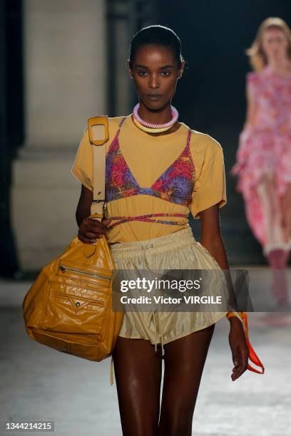 Model walks the runway during the Isabel Marant Ready to Wear Spring/Summer 2022 fashion show as part of the Paris Fashion Week on September 30, 2021...