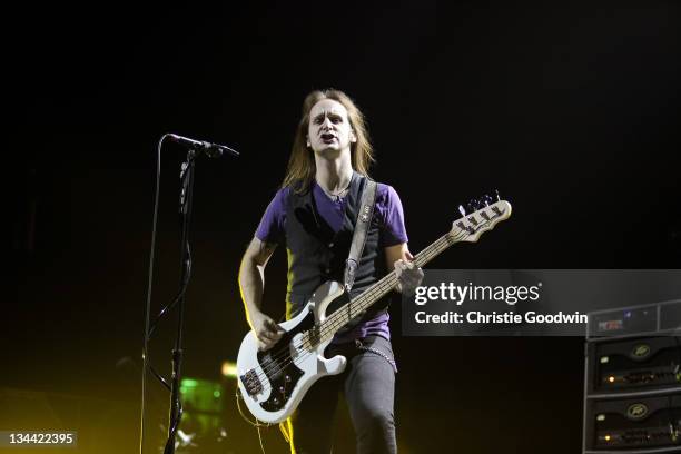 Jon Lawhon of Black Stone Cherry performs on stage at Wembley Arena on November 29, 2011 in London, United Kingdom.