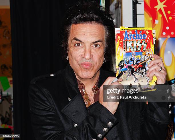 Paul Stanley of the Rock Band KISS signs copies of "Archie Meets KISS Part 1" comic book at Golden Apple Comics on November 30, 2011 in Los Angeles,...