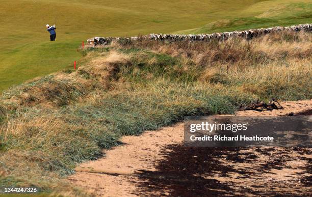 Tyrrell Hatton of England plays his second shot on the 12th hole during Day Two of The Alfred Dunhill Links Championship at Kingsbarns on October 01,...