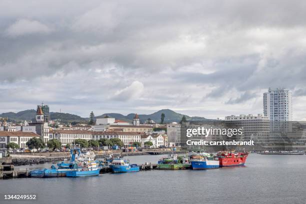 view to the commercial harbor and the city skyline om ponta delgada - ponta delgada stock pictures, royalty-free photos & images