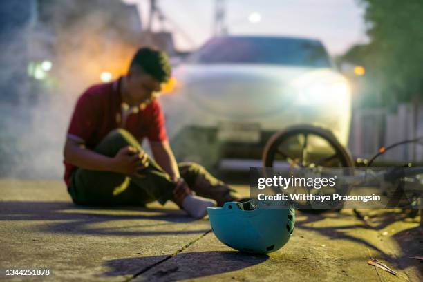 blue bike on a pedestrian crossing after fatal incident with a car - motorbike on road stock pictures, royalty-free photos & images