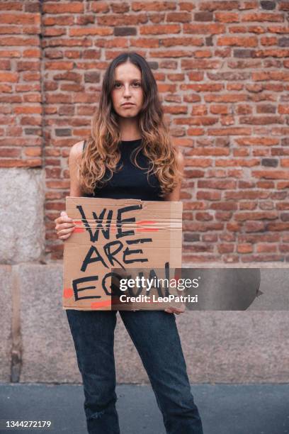 young student activist - human rights march stock pictures, royalty-free photos & images