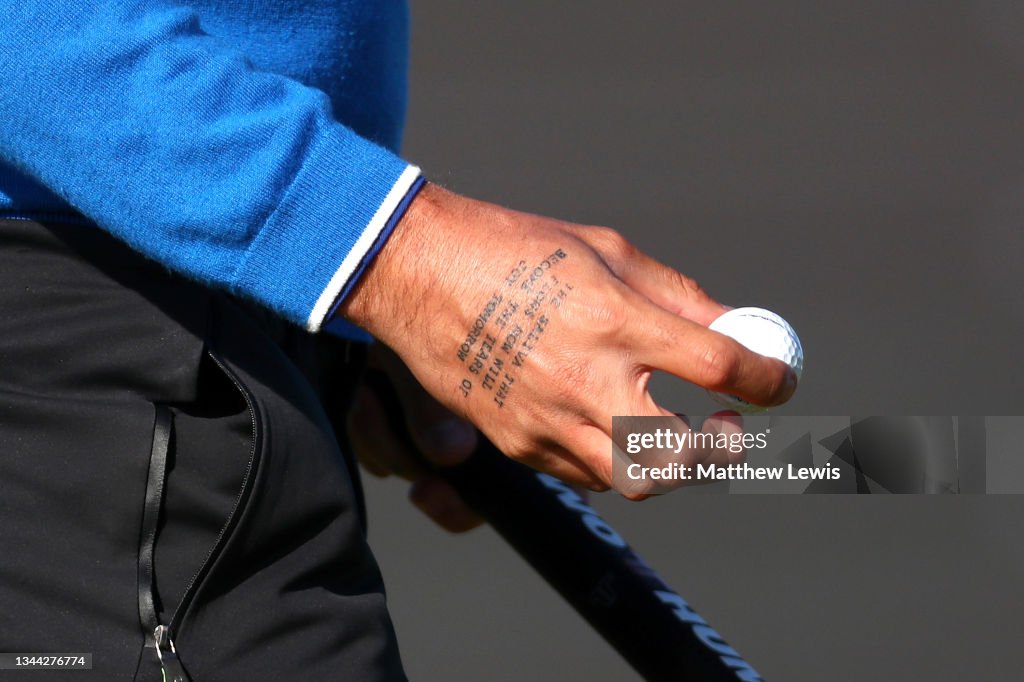 A tattoo is seen on the hand of Matthieu Pavon of France during Day