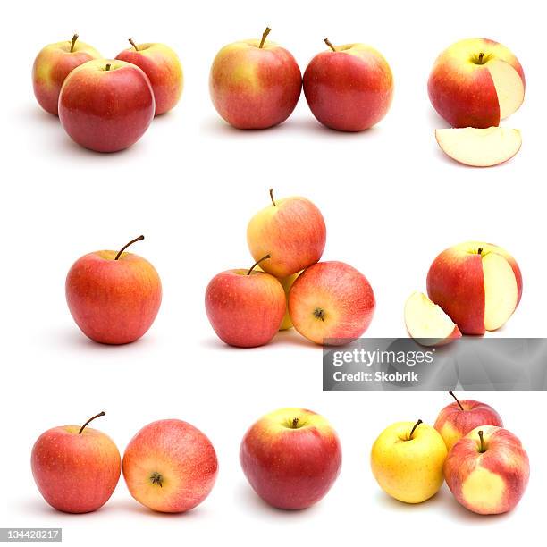 red apples isolated on white background - apple slice photos et images de collection