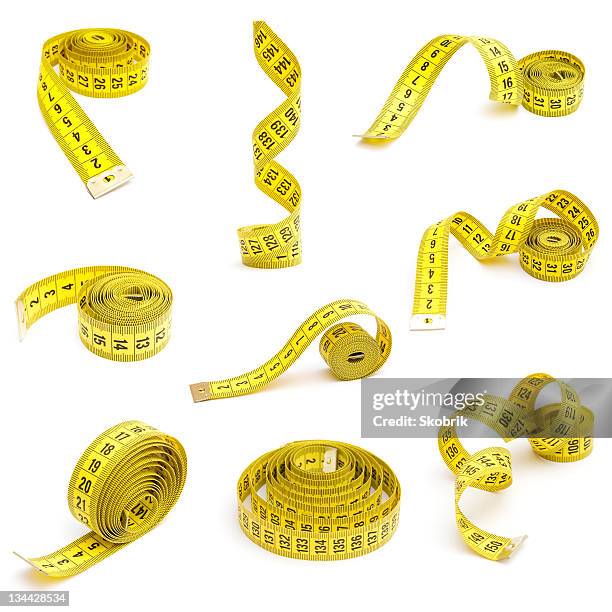 measuring tapes - cinta-métrica fotografías e imágenes de stock